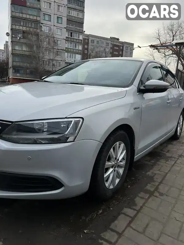 Седан Volkswagen Jetta 2013 1.4 л. Автомат обл. Донецкая, Покровск (Красноармейск) - Фото 1/9