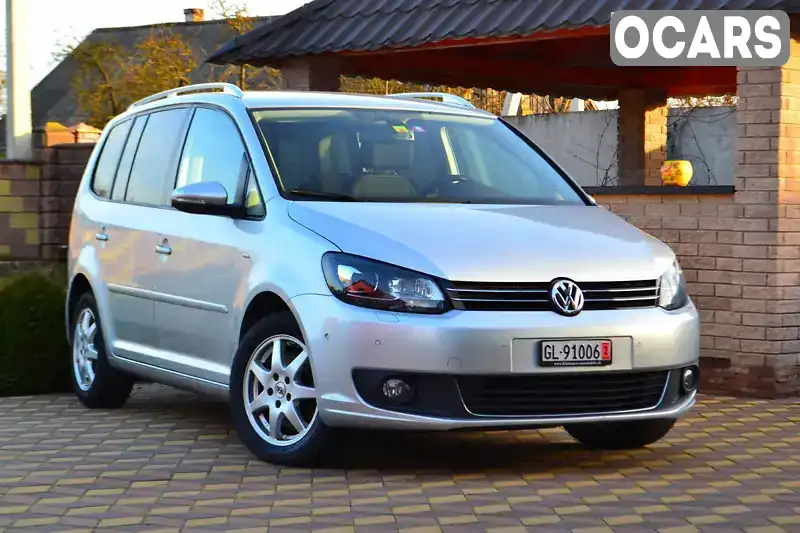 Мінівен Volkswagen Touran 2014 2 л. Автомат обл. Рівненська, Сарни - Фото 1/21