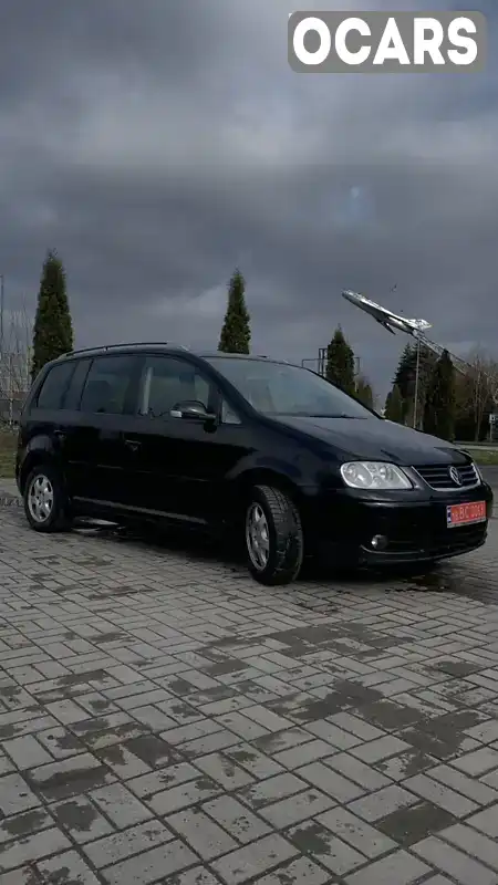 Минивэн Volkswagen Touran 2006 1.4 л. Ручная / Механика обл. Ровенская, Дубно - Фото 1/11