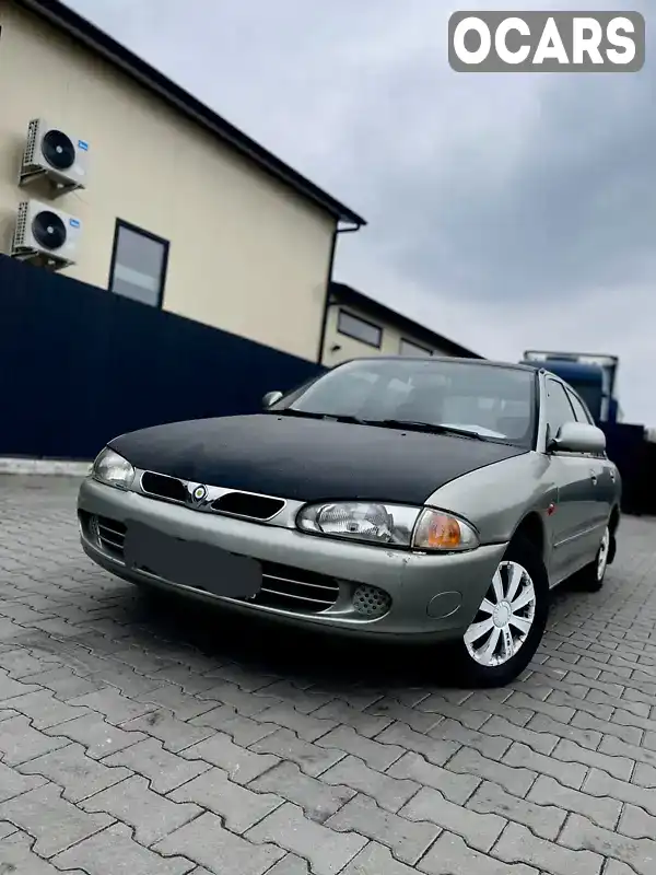 Седан Mitsubishi Lancer 1995 1.6 л. Ручна / Механіка обл. Хмельницька, Хмельницький - Фото 1/12