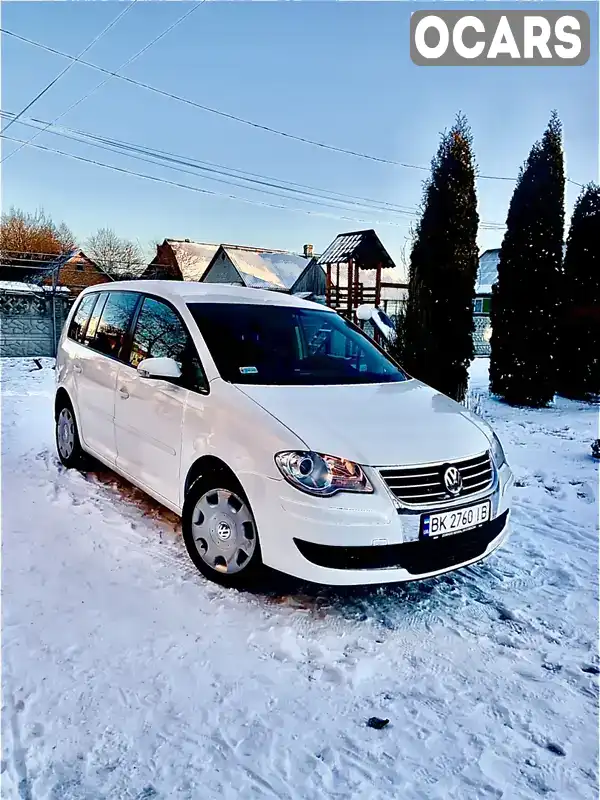 Минивэн Volkswagen Touran 2009 1.98 л. Ручная / Механика обл. Ровенская, Ровно - Фото 1/12