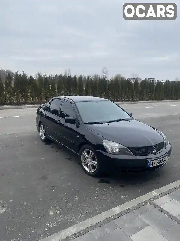 Седан Mitsubishi Lancer 2007 null_content л. Автомат обл. Київська, Київ - Фото 1/21