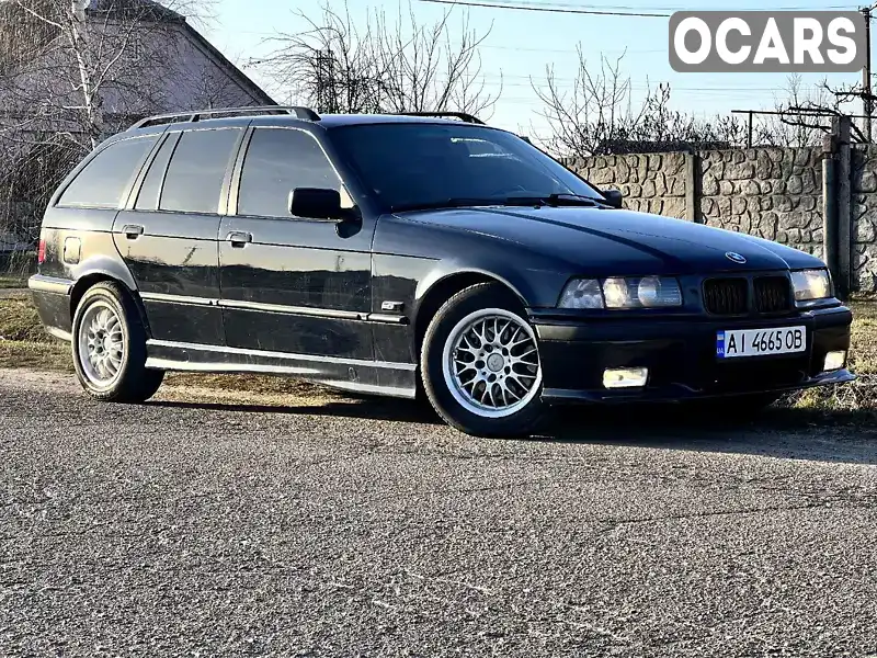 Универсал BMW 3 Series 1996 2.49 л. Автомат обл. Киевская, Киев - Фото 1/19
