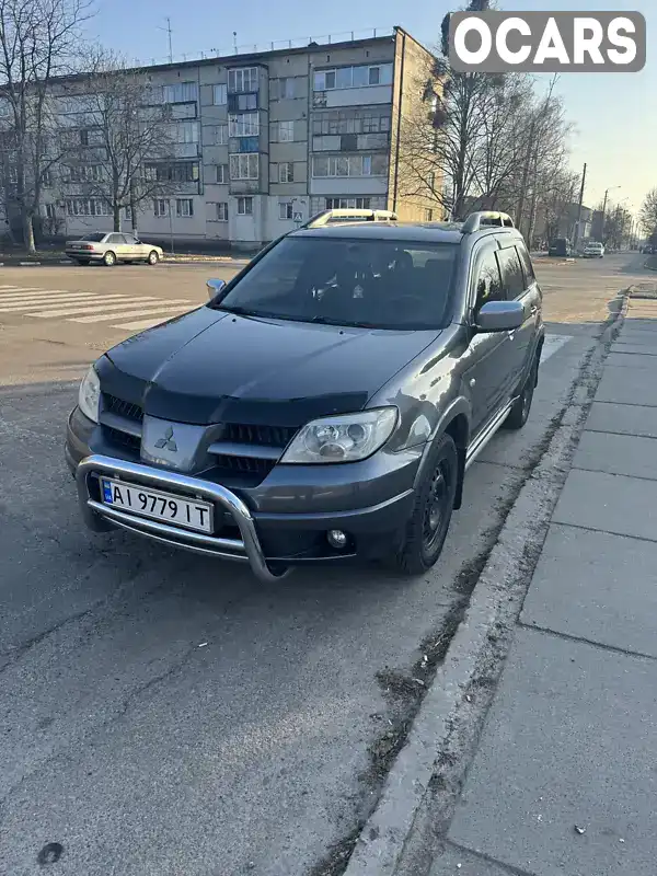 Позашляховик / Кросовер Mitsubishi Outlander 2005 2.38 л. Автомат обл. Київська, Обухів - Фото 1/16