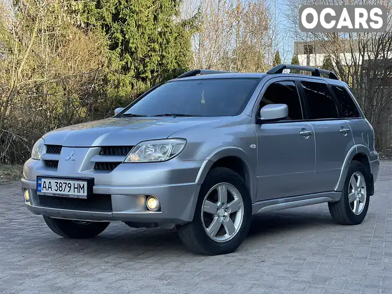 Внедорожник / Кроссовер Mitsubishi Outlander 2008 2.4 л. Автомат обл. Ровенская, Ровно - Фото 1/21