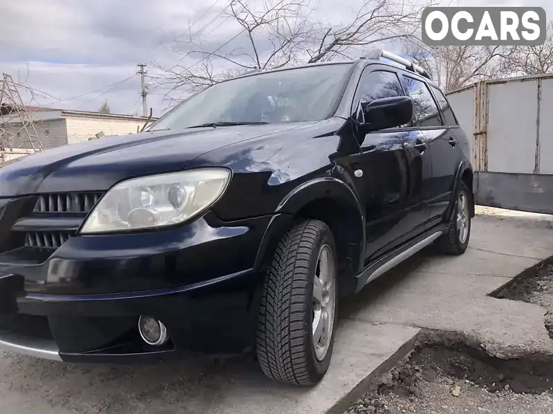 Позашляховик / Кросовер Mitsubishi Outlander 2005 2.4 л. Автомат обл. Дніпропетровська, Дніпро (Дніпропетровськ) - Фото 1/8