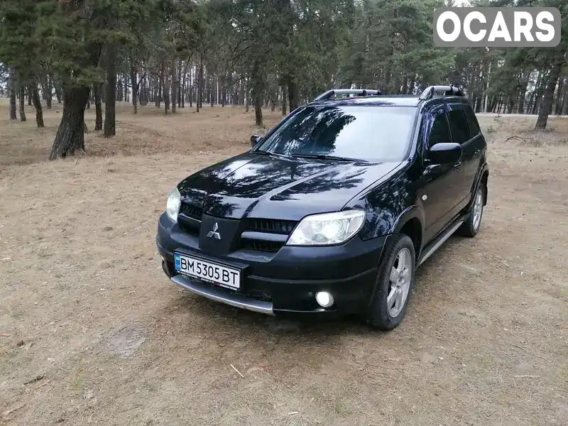 Внедорожник / Кроссовер Mitsubishi Outlander 2007 2.38 л. Автомат обл. Сумская, Сумы - Фото 1/14