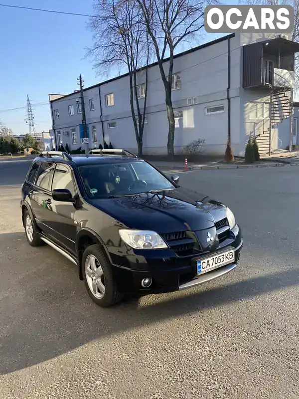 Позашляховик / Кросовер Mitsubishi Outlander 2008 2 л. Ручна / Механіка обл. Київська, Київ - Фото 1/19