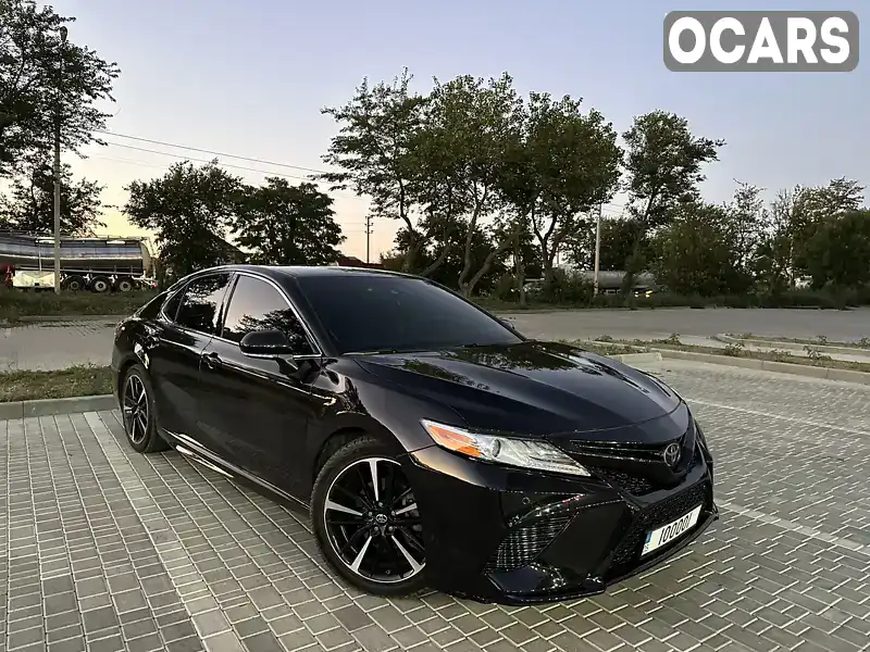 Седан Toyota Camry 2018 2.49 л. Автомат обл. Донецька, Покровськ (Красноармійськ) - Фото 1/21