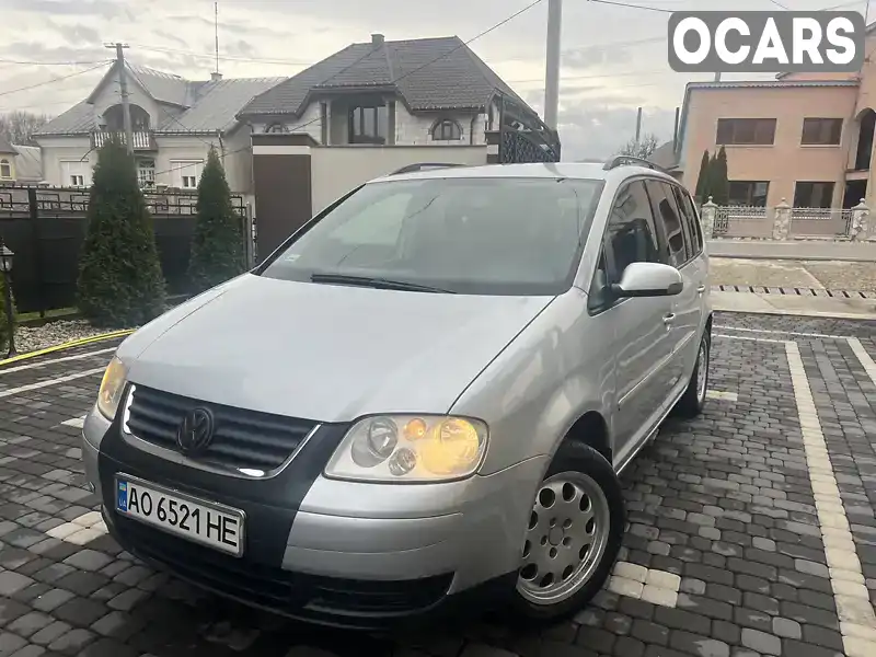 Мінівен Volkswagen Touran 2004 1.9 л. Ручна / Механіка обл. Закарпатська, Тячів - Фото 1/21