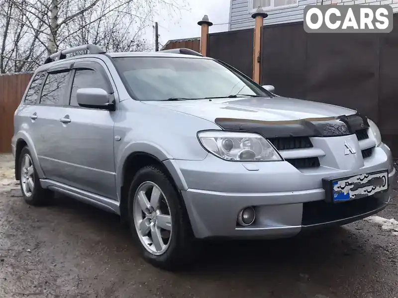 Внедорожник / Кроссовер Mitsubishi Outlander 2006 2.4 л. Автомат обл. Харьковская, Харьков - Фото 1/15