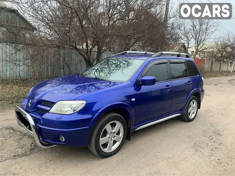 Позашляховик / Кросовер Mitsubishi Outlander 2006 2.38 л. Автомат обл. Полтавська, Кременчук - Фото 1/11