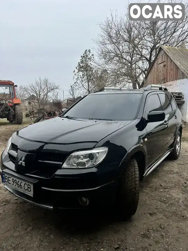 Внедорожник / Кроссовер Mitsubishi Outlander 2007 2.38 л. Автомат обл. Николаевская, Николаев - Фото 1/9