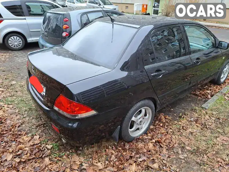 Седан Mitsubishi Lancer 2006 1.58 л. Автомат обл. Київська, Київ - Фото 1/4