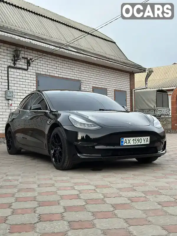 Седан Tesla Model 3 2019 null_content л. обл. Харьковская, Харьков - Фото 1/21