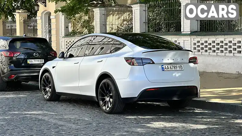 Внедорожник / Кроссовер Tesla Model Y 2023 null_content л. обл. Киевская, Киев - Фото 1/21