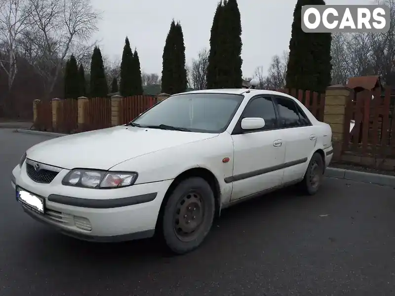 Седан Mazda 626 1997 1.8 л. Ручна / Механіка обл. Дніпропетровська, Дніпро (Дніпропетровськ) - Фото 1/14