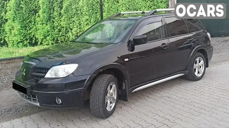 Внедорожник / Кроссовер Mitsubishi Outlander 2007 2.4 л. Автомат обл. Хмельницкая, Хмельницкий - Фото 1/21