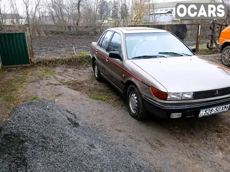 Седан Mitsubishi Lancer 1988 null_content л. Ручна / Механіка обл. Хмельницька, Теофіполь - Фото 1/5