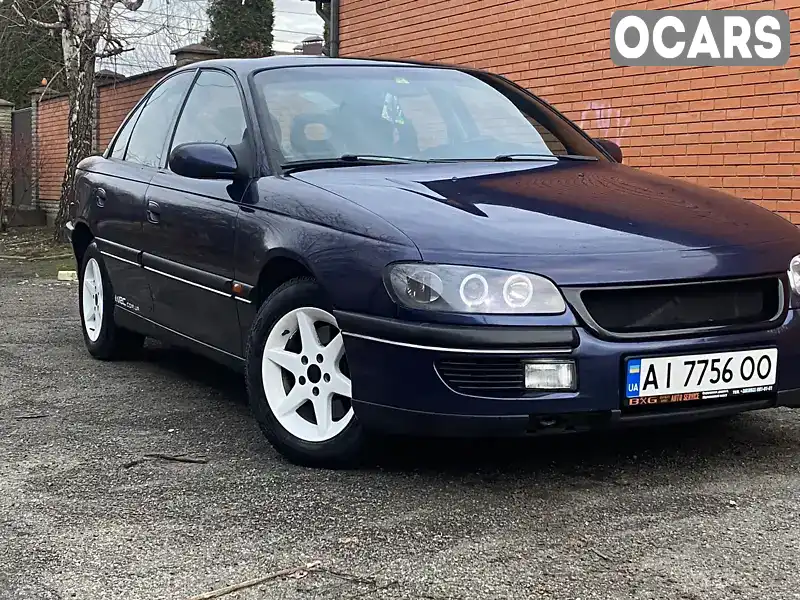 Седан Opel Omega 1996 2.5 л. Ручна / Механіка обл. Київська, Вишневе - Фото 1/20