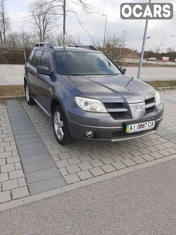 Позашляховик / Кросовер Mitsubishi Outlander 2008 2 л. Ручна / Механіка обл. Київська, Вишгород - Фото 1/13