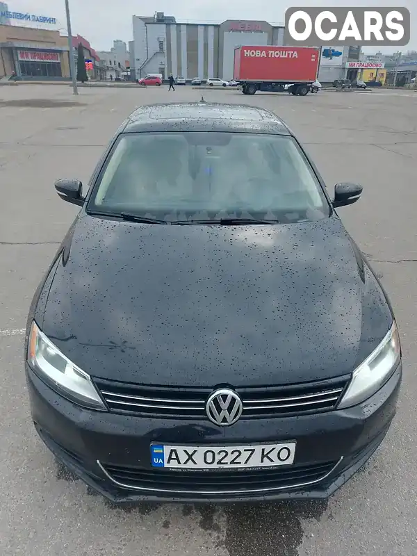 Седан Volkswagen Jetta 2013 2.48 л. Автомат обл. Харьковская, Харьков - Фото 1/21