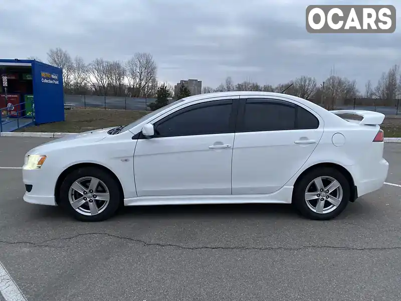 Седан Mitsubishi Lancer 2009 2 л. Автомат обл. Київська, Київ - Фото 1/21