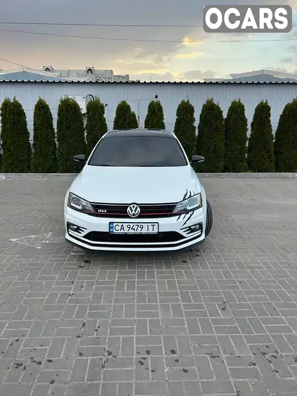 Седан Volkswagen Jetta 2015 2 л. Автомат обл. Черкасская, Черкассы - Фото 1/11