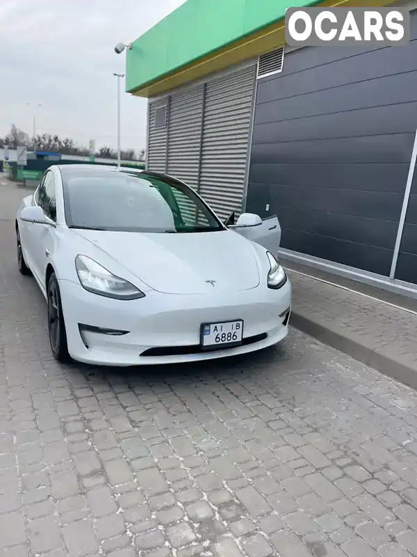 Седан Tesla Model 3 2018 null_content л. Автомат обл. Киевская, Бровары - Фото 1/21
