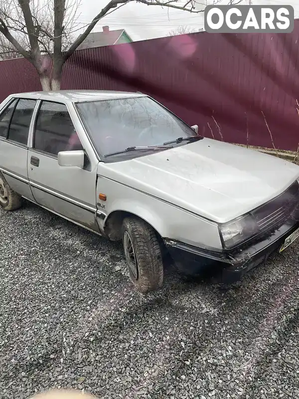 Седан Mitsubishi Lancer 1987 1.5 л. Ручна / Механіка обл. Рівненська, Здолбунів - Фото 1/5