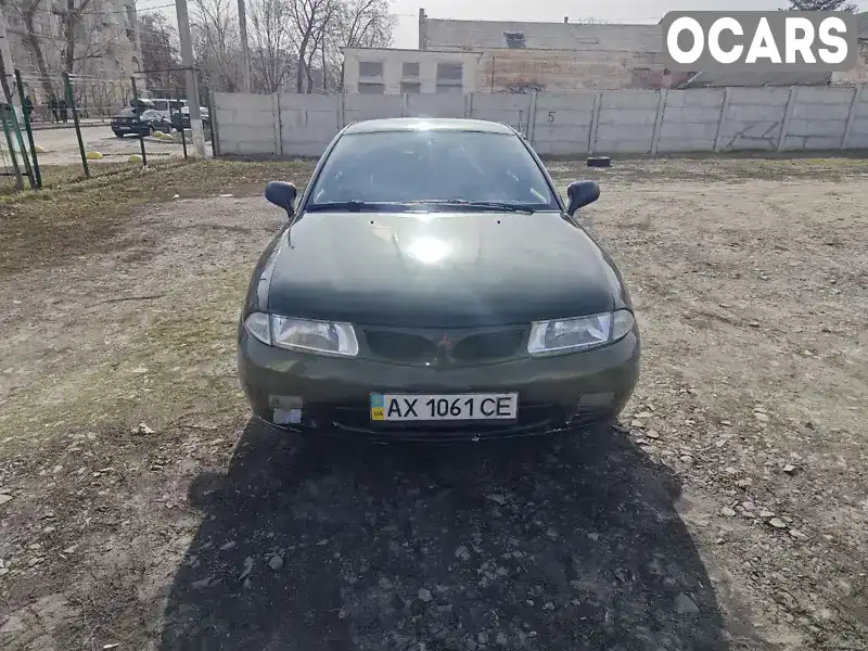 Лифтбек Mitsubishi Carisma 1996 1.8 л. Ручная / Механика обл. Харьковская, Харьков - Фото 1/16