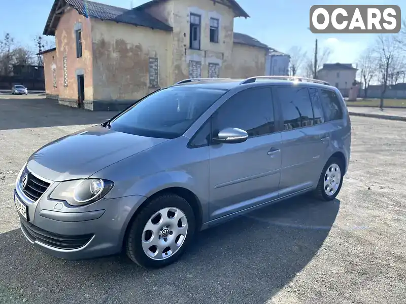 Минивэн Volkswagen Touran 2009 1.9 л. Автомат обл. Житомирская, Коростень - Фото 1/21