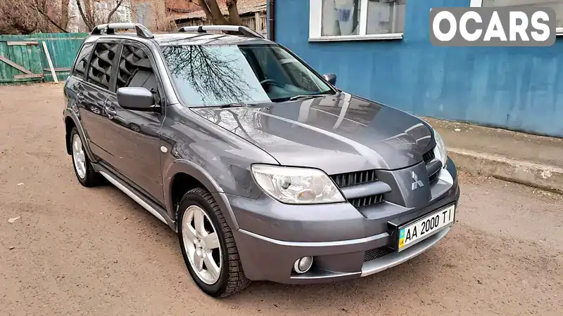 Внедорожник / Кроссовер Mitsubishi Outlander 2009 2.38 л. Автомат обл. Черниговская, Чернигов - Фото 1/10