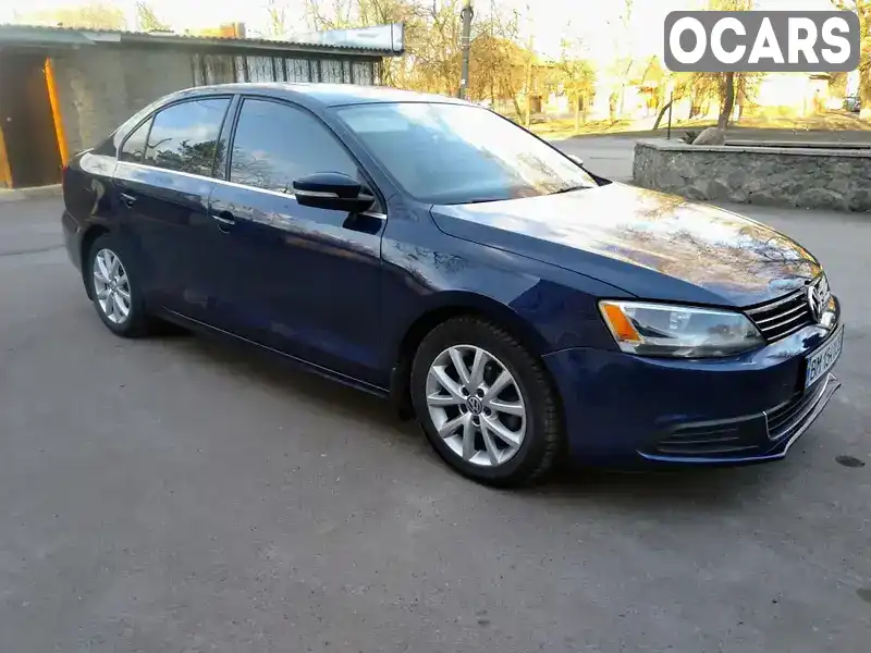 Седан Volkswagen Jetta 2014 1.8 л. Ручная / Механика обл. Сумская, Ромны - Фото 1/9