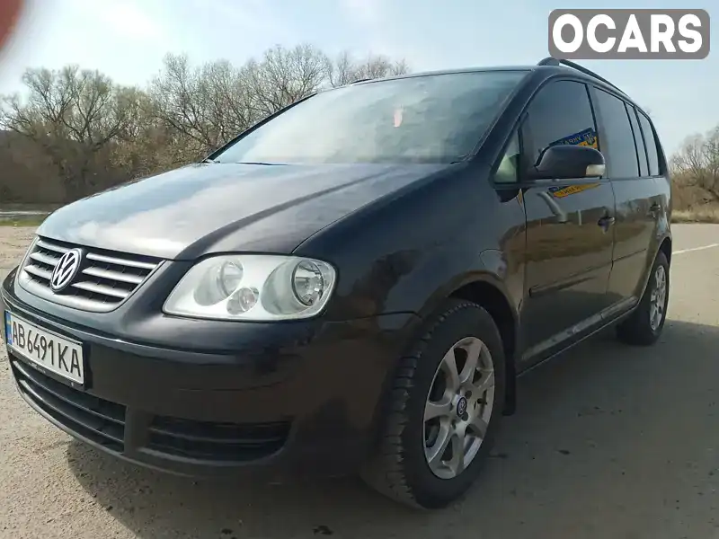 Минивэн Volkswagen Touran 2005 1.9 л. обл. Винницкая, Ямполь - Фото 1/14