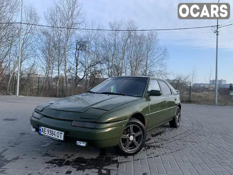 Хетчбек Mazda 323 1991 1.6 л. Ручна / Механіка обл. Дніпропетровська, Дніпро (Дніпропетровськ) - Фото 1/16