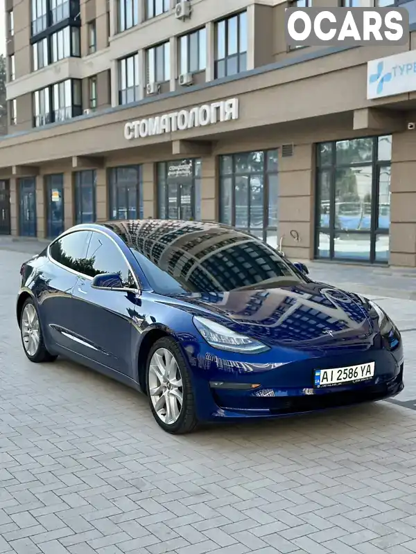 Седан Tesla Model 3 2018 null_content л. Автомат обл. Киевская, Киев - Фото 1/21