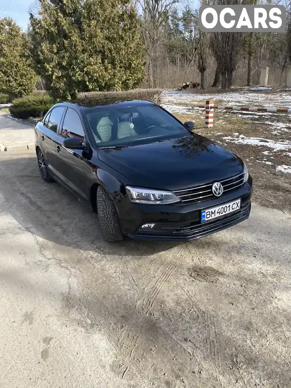 Седан Volkswagen Jetta 2015 1.8 л. Автомат обл. Полтавська, Полтава - Фото 1/12