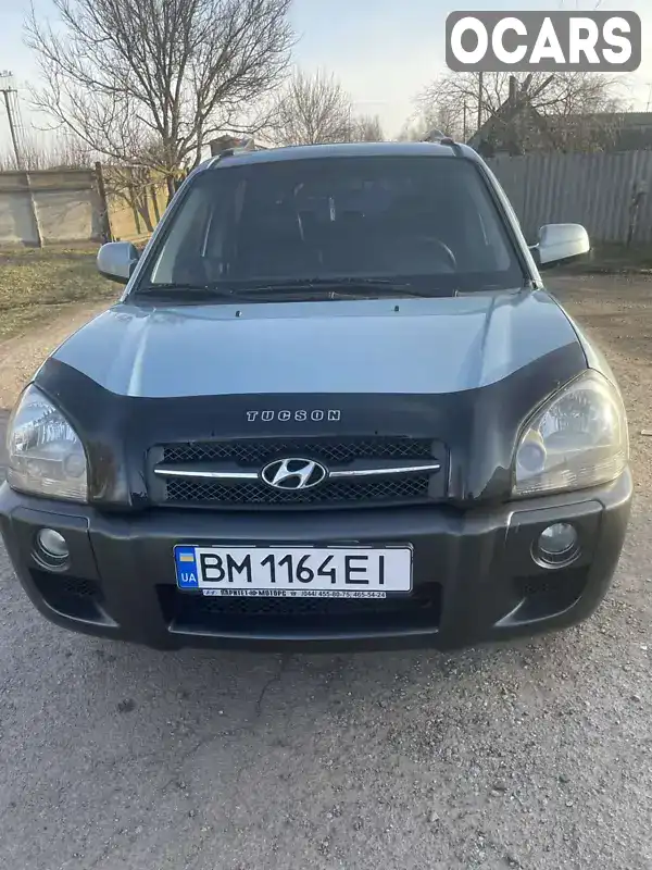 Внедорожник / Кроссовер Hyundai Tucson 2008 2 л. Автомат обл. Сумская, Ромны - Фото 1/16