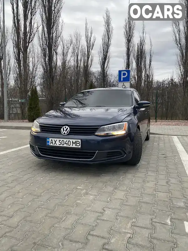 Седан Volkswagen Jetta 2013 2.48 л. обл. Полтавская, Кременчуг - Фото 1/21