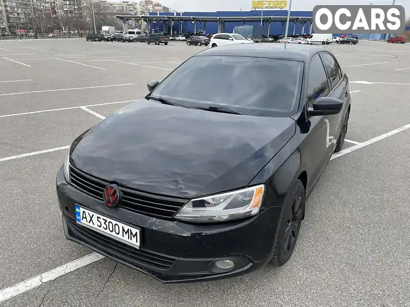 Седан Volkswagen Jetta 2013 2 л. Автомат обл. Київська, Київ - Фото 1/21