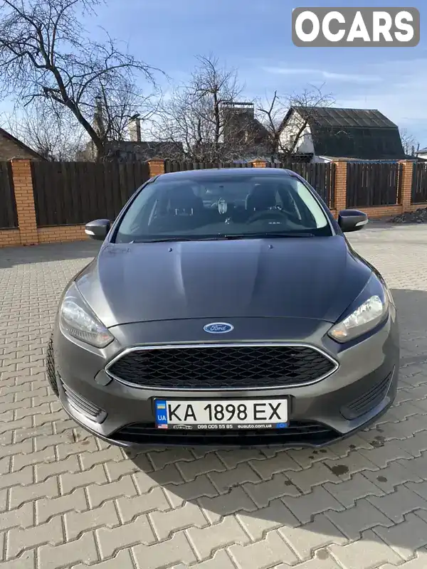 Седан Ford Focus 2015 2 л. Автомат обл. Киевская, Вышневое - Фото 1/10