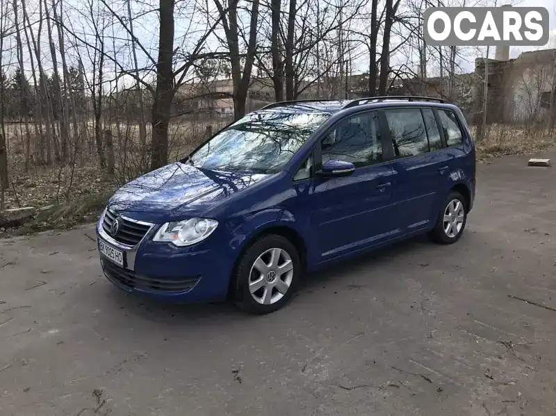 Мінівен Volkswagen Touran 2009 1.6 л. Ручна / Механіка обл. Рівненська, Костопіль - Фото 1/21