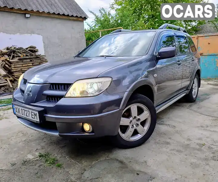 Позашляховик / Кросовер Mitsubishi Outlander 2008 2 л. Ручна / Механіка обл. Харківська, Зміїв - Фото 1/21