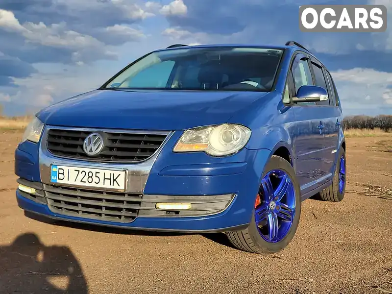 Мінівен Volkswagen Touran 2007 1.9 л. Автомат обл. Полтавська, Велика Багачка - Фото 1/21