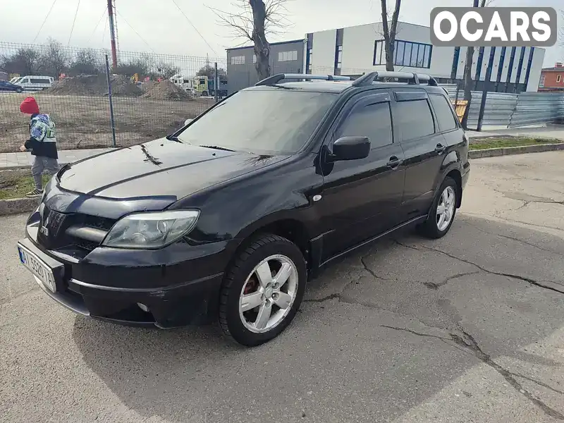 Внедорожник / Кроссовер Mitsubishi Outlander 2005 2.4 л. Автомат обл. Киевская, Белая Церковь - Фото 1/14