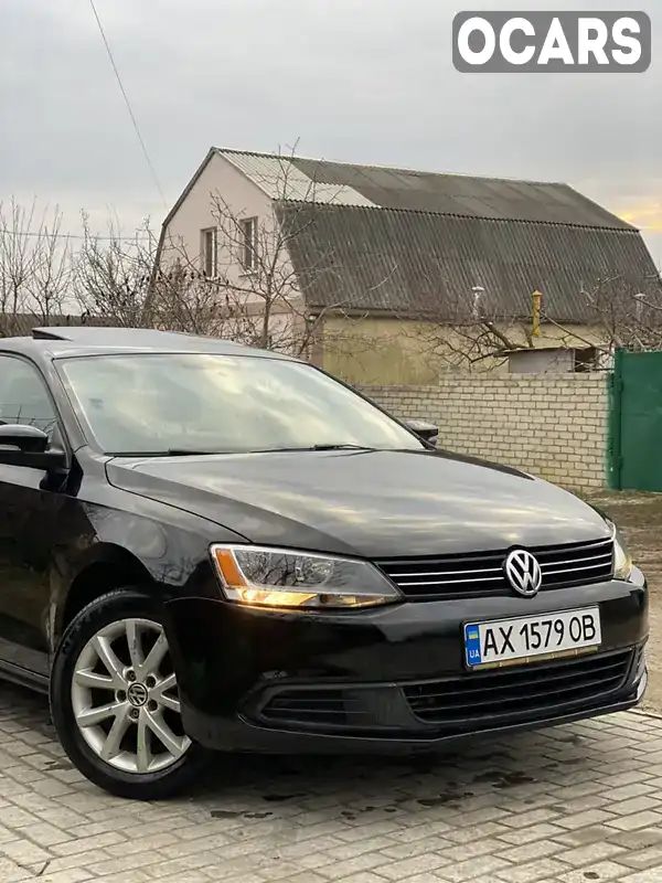 Седан Volkswagen Jetta 2011 2.48 л. Автомат обл. Харківська, Харків - Фото 1/21