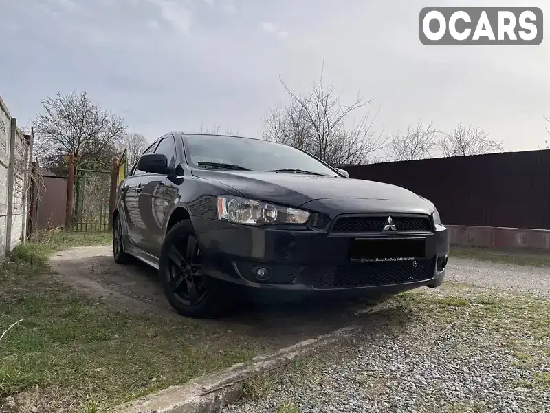 Седан Mitsubishi Lancer 2007 2 л. Автомат обл. Київська, Київ - Фото 1/21