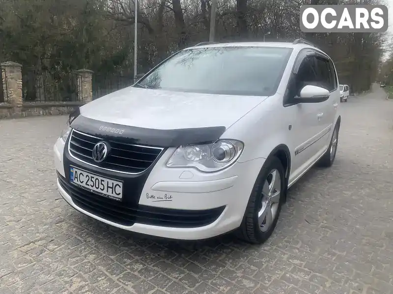 Минивэн Volkswagen Touran 2009 1.97 л. Автомат обл. Черновицкая, Черновцы - Фото 1/21