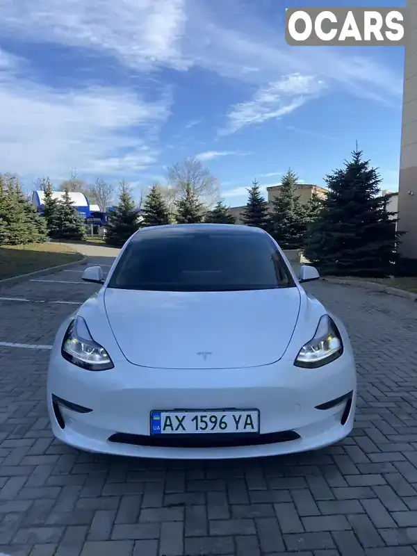Седан Tesla Model 3 2023 null_content л. обл. Харьковская, Харьков - Фото 1/21